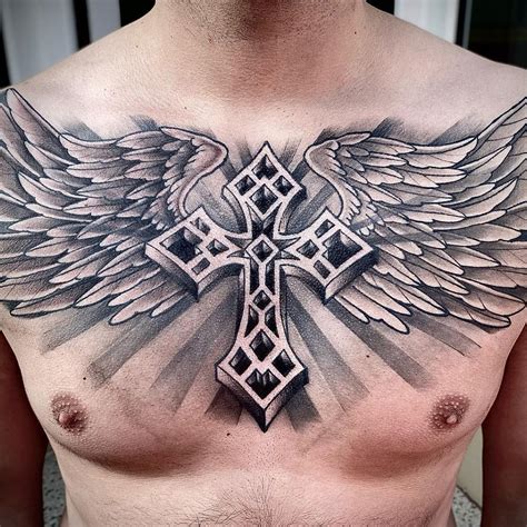 cross with wings tattoo chest|cross tattoos full chest.